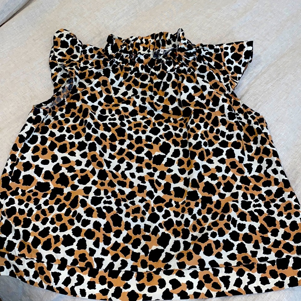 EUC~Sea New York animal print top with ruffles and button back, size M